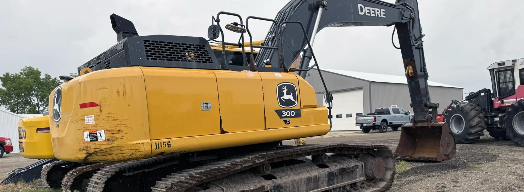 John Deere 300P excavator on lot